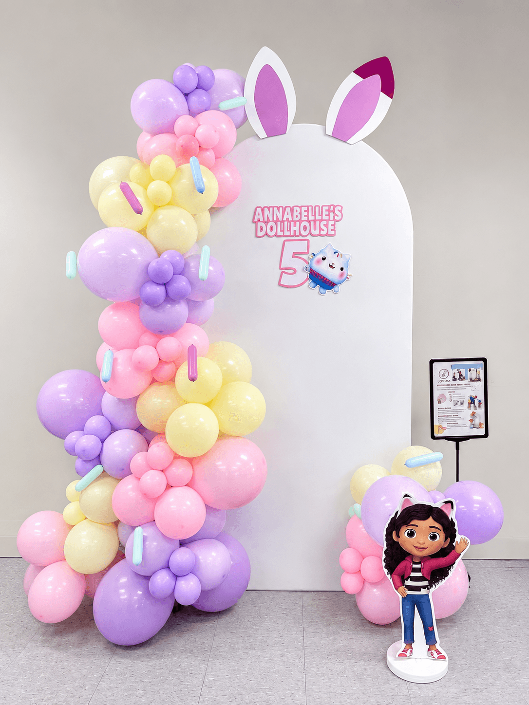 A Dollhouse Dream Come to Life featuring adorable bunny ears, soft spring-inspired colors, and playful details